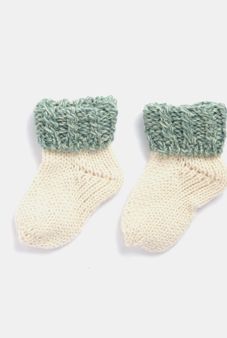 Baby merino knitted Aran socks in cream