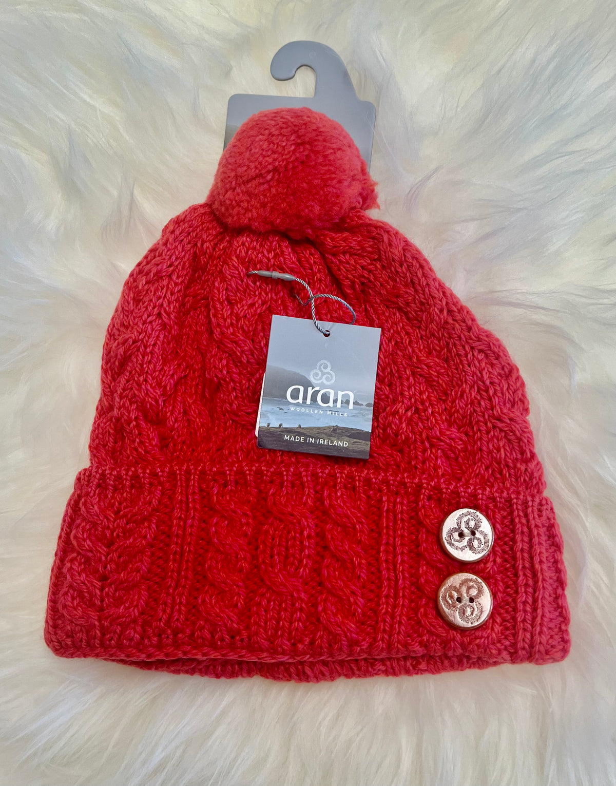 Aran Woollen Mills Super soft Merino bobble . Coral