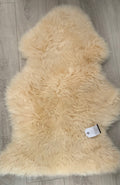 Sheepskin pet rug - natural, medium sized rug- fabric-backed non-slip