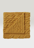 Atlantic  Shore Aran design merino baby blanket in sunflower gold