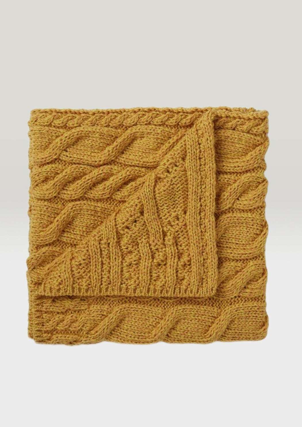 Atlantic  Shore Aran design merino baby blanket in sunflower gold